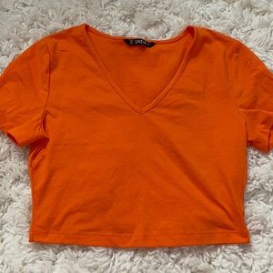 orange cropped top